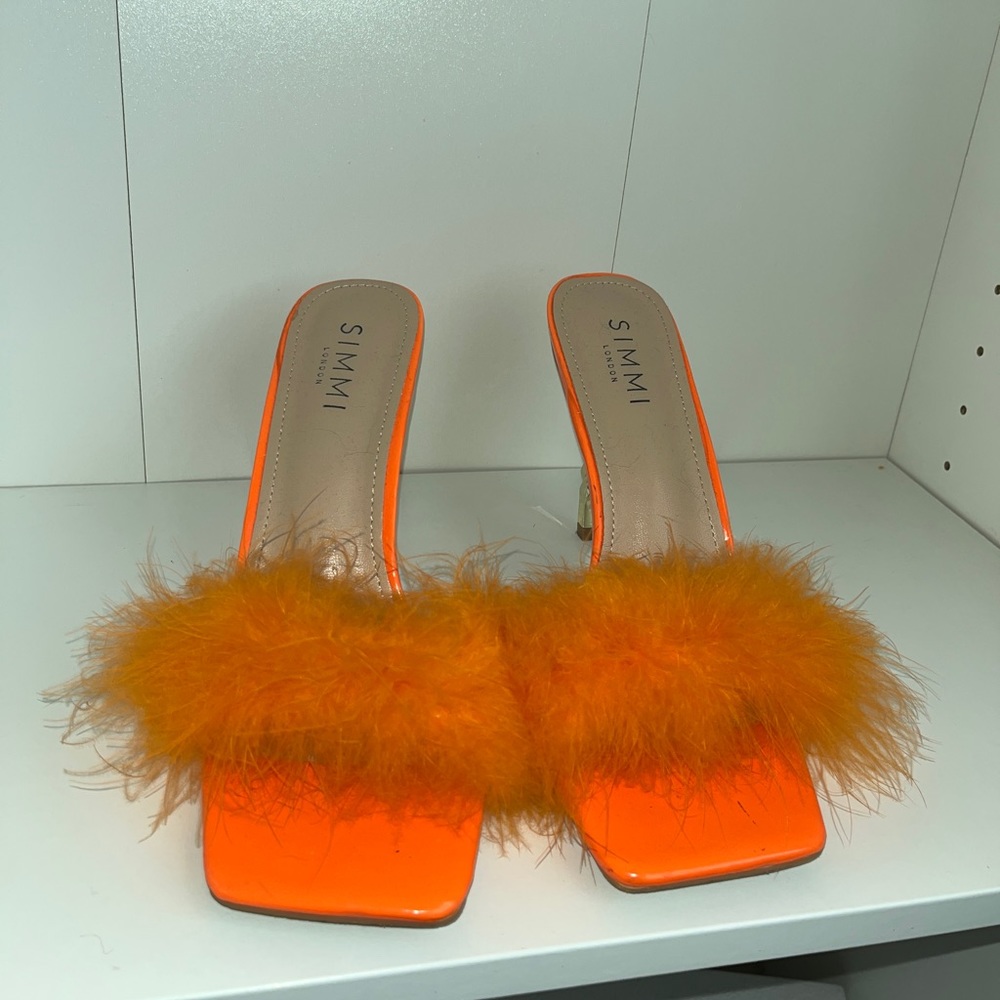 Orange fuzzy heels